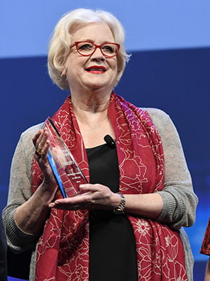 Marion Edwards with her Variety Vanguard Award in Cannes